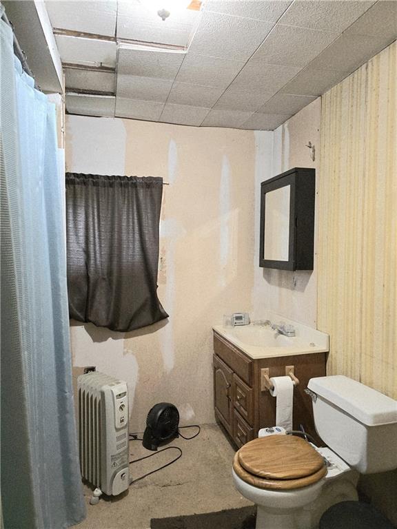 609 Trout Run Road Punxsutawney, PA 15767 - Photo 28 of 34 a bathroom with a toilet a sink and mirror