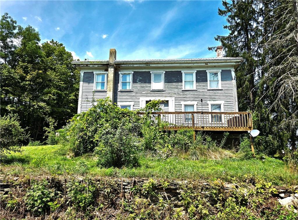 609 Trout Run Road Punxsutawney, PA 15767 - Photo 5 of 34 a front view of a house with a yard