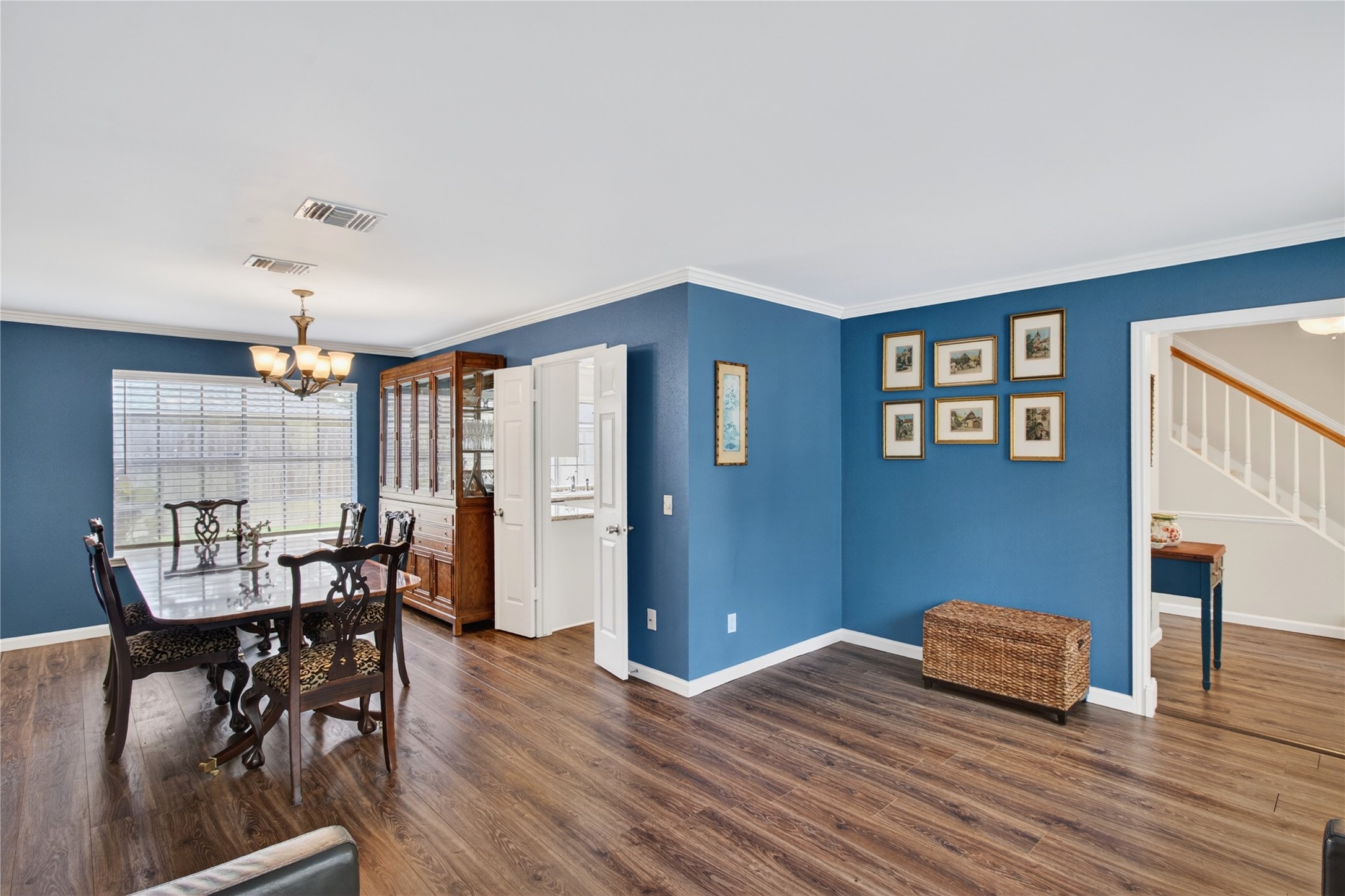 20214 Woodsboro Court Spring, TX 77388 - Photo 8 of 50 Formal Living & Formal Dining connect to Entry Hall & Kitchen! Recently Painted Interior! Luxury Vinyl Plank throughout 1st Floor!