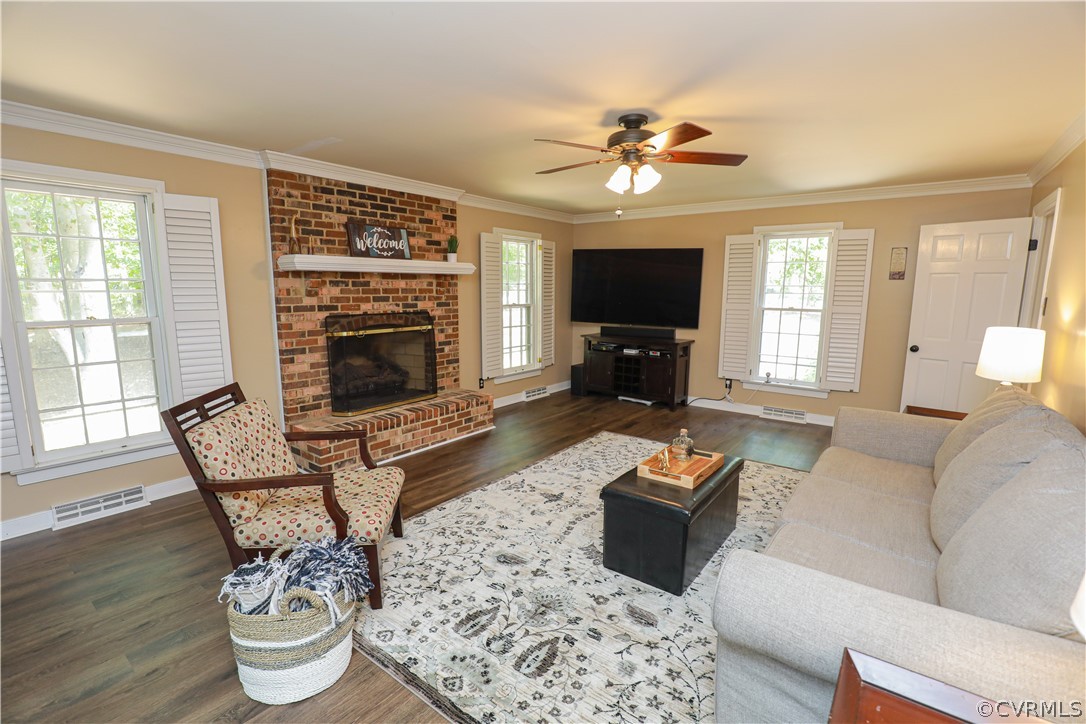 13619 Winterberry Ridge Midlothian, VA 23112 - Photo 22 of 48 a living room with furniture and a fireplace