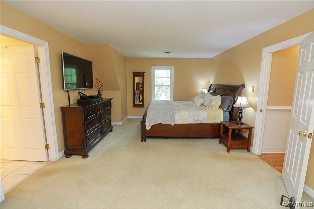 13619 Winterberry Ridge Midlothian, VA 23112 - Photo 24 of 48 a bedroom with a bed and furniture