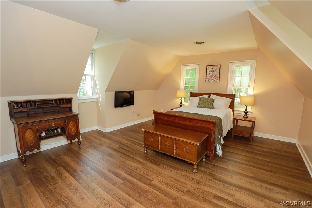 13619 Winterberry Ridge Midlothian, VA 23112 - Photo 34 of 48 a bedroom with a bed and a flat screen tv