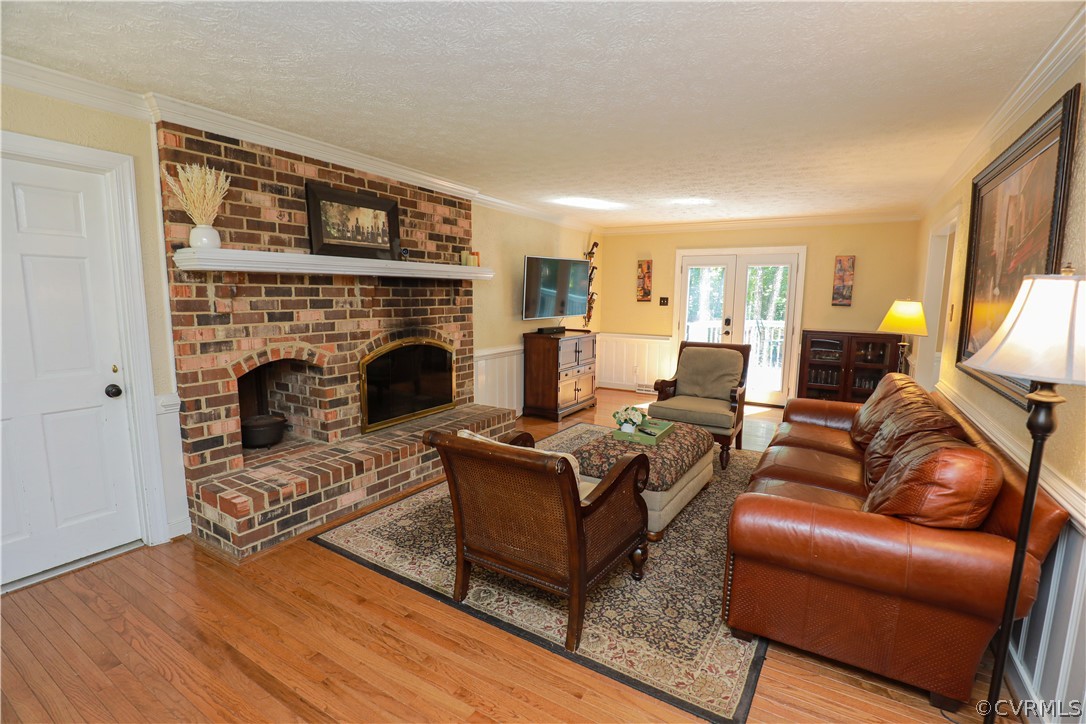 13619 Winterberry Ridge Midlothian, VA 23112 - Photo 4 of 48 a living room with furniture and a fireplace