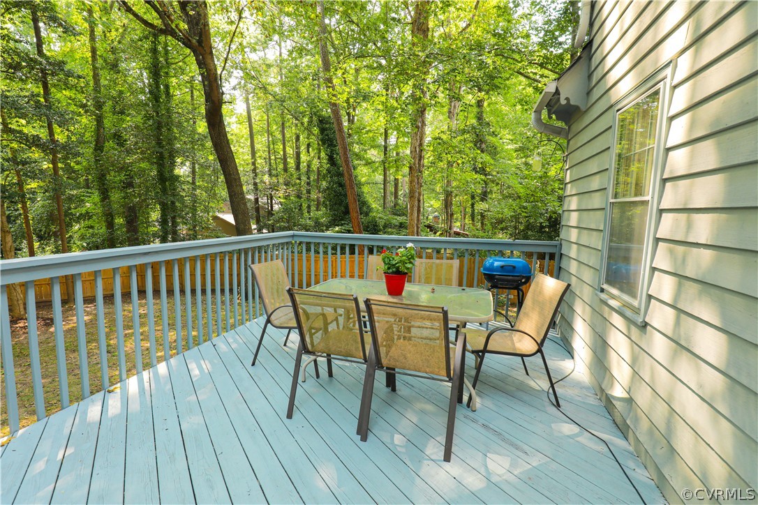 13619 Winterberry Ridge Midlothian, VA 23112 - Photo 41 of 48 a view of a chairs and table on the wooden deck
