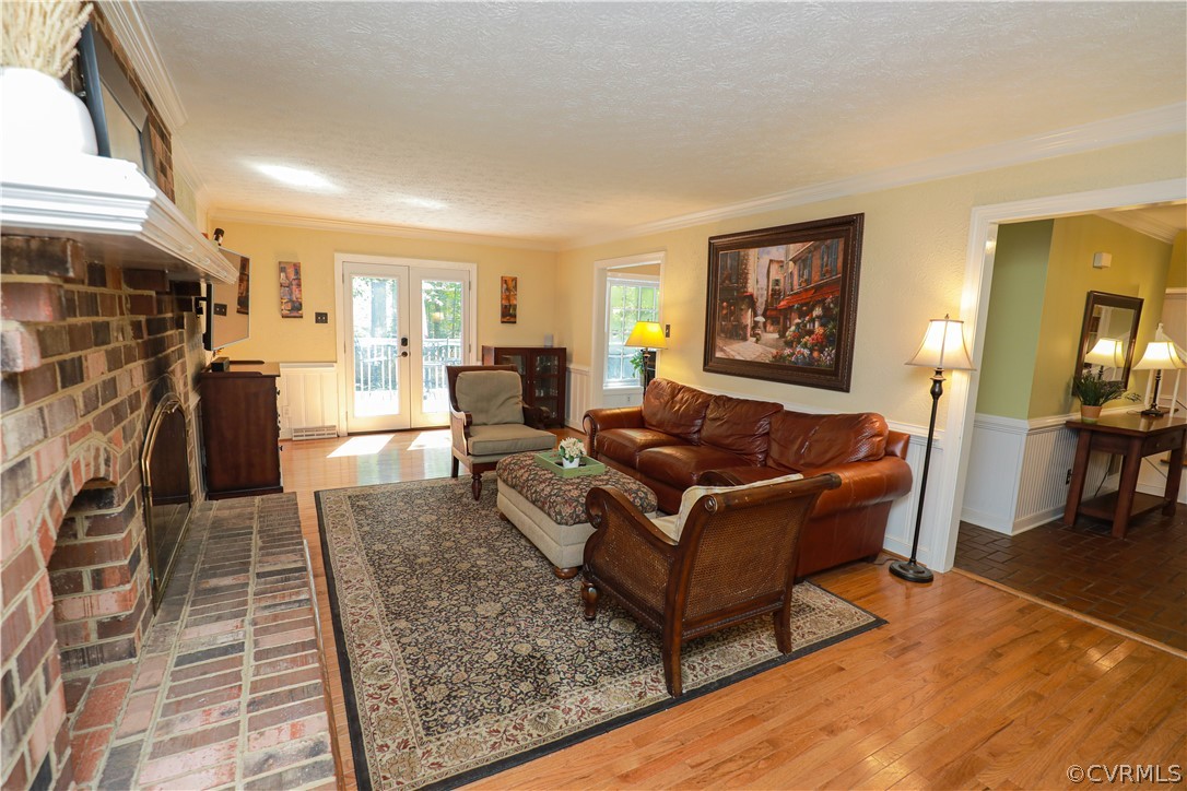 13619 Winterberry Ridge Midlothian, VA 23112 - Photo 6 of 48 a living room with furniture and a fireplace