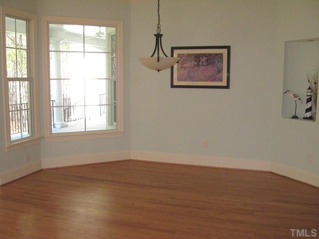 3740 Mason Road New Hill, NC 27562 - Photo 8 of 20 Convenient breakfast area with tall windows Breakfast Area