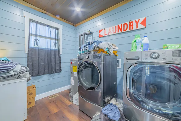 a utility room with dryer and washer
