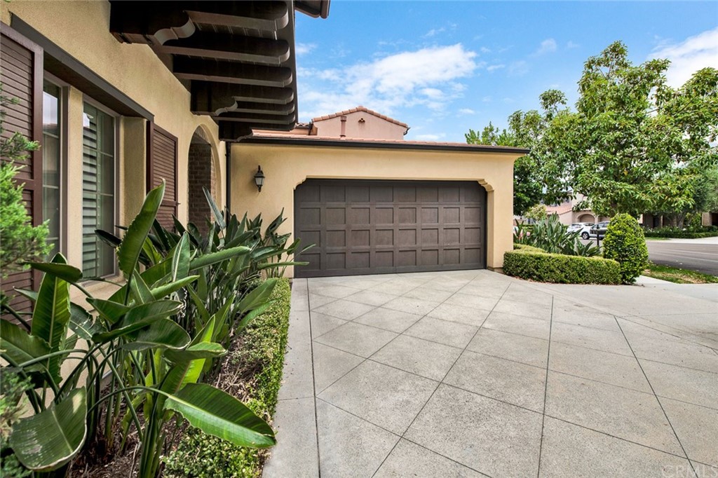 23 White Sage Irvine, CA 92618 - Photo 3 of 5 a view of entryway with flower plants