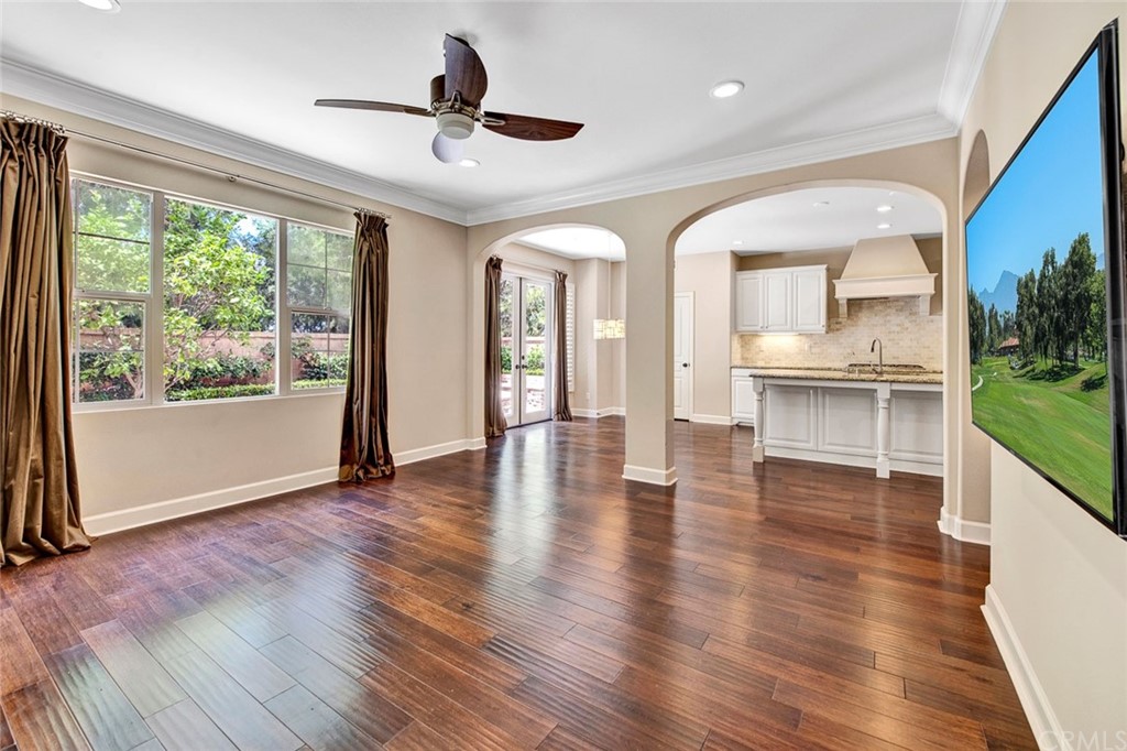 23 White Sage Irvine, CA 92618 - Photo 5 of 5 a view of an empty room with a window and wooden floor