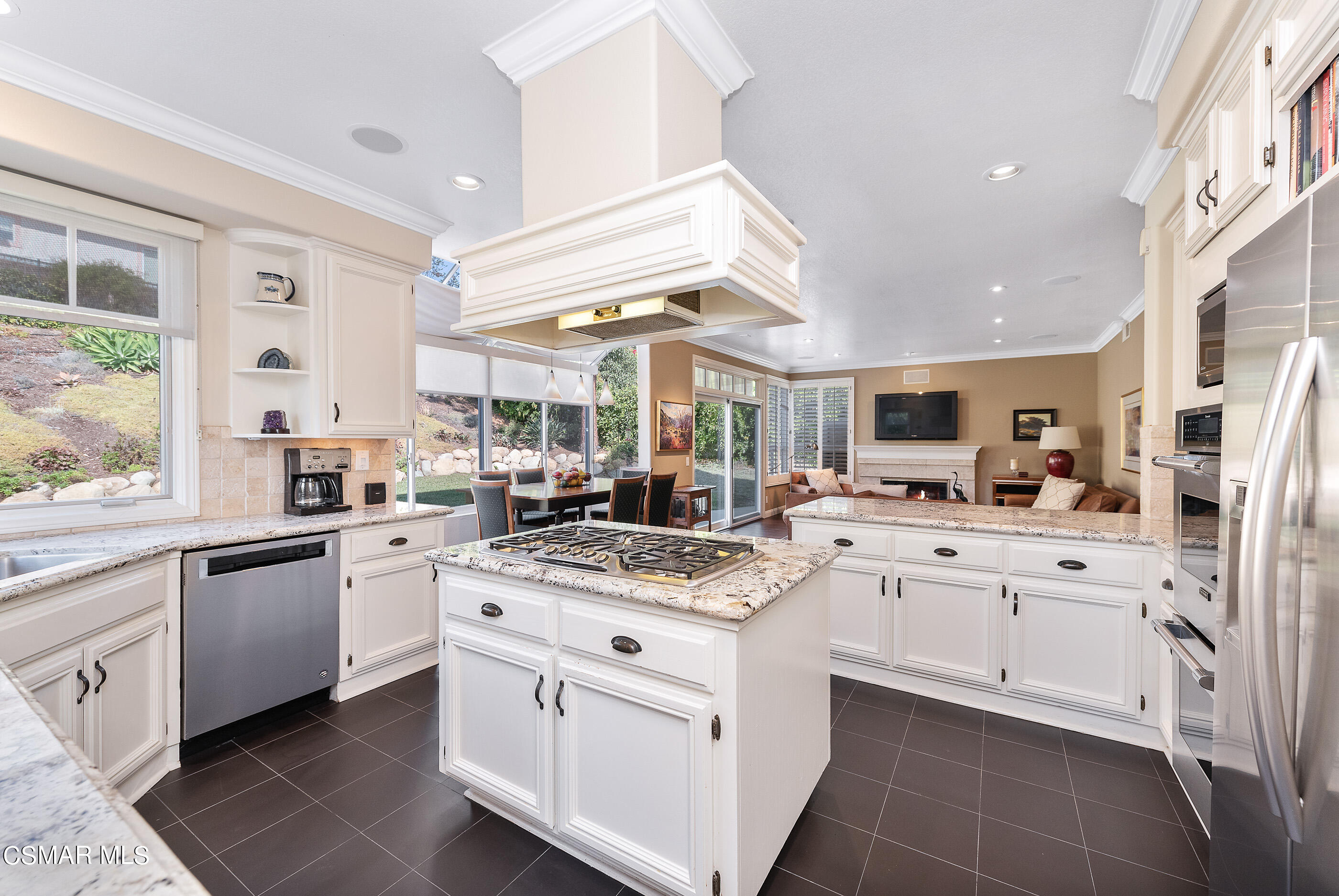 3019 Shadow Hill Circle Thousand Oaks, CA 91360 - Photo 2 of 30 a kitchen with white cabinets appliances and a window
