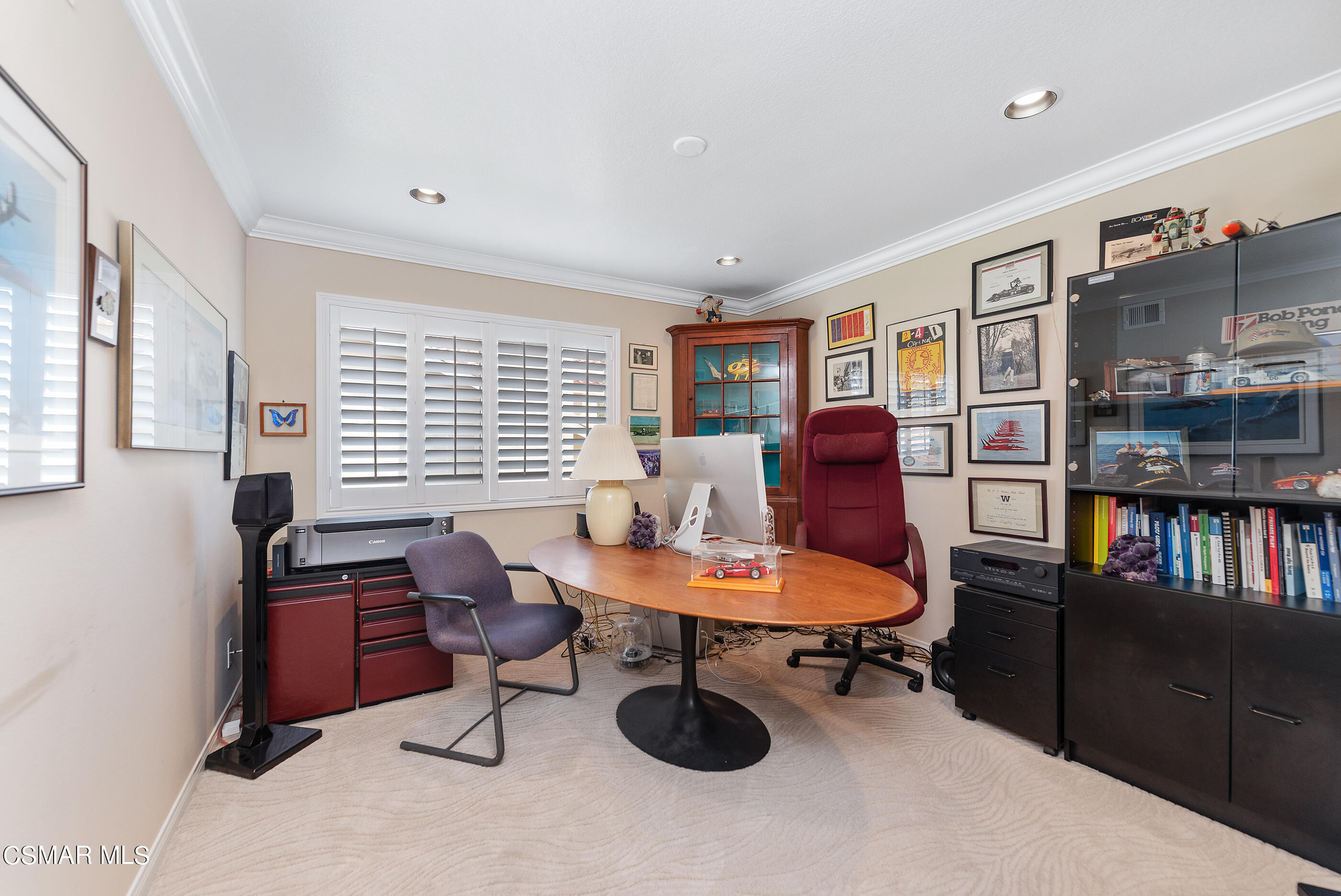 3019 Shadow Hill Circle Thousand Oaks, CA 91360 - Photo 21 of 30 a living room with furniture a bookshelf and a window