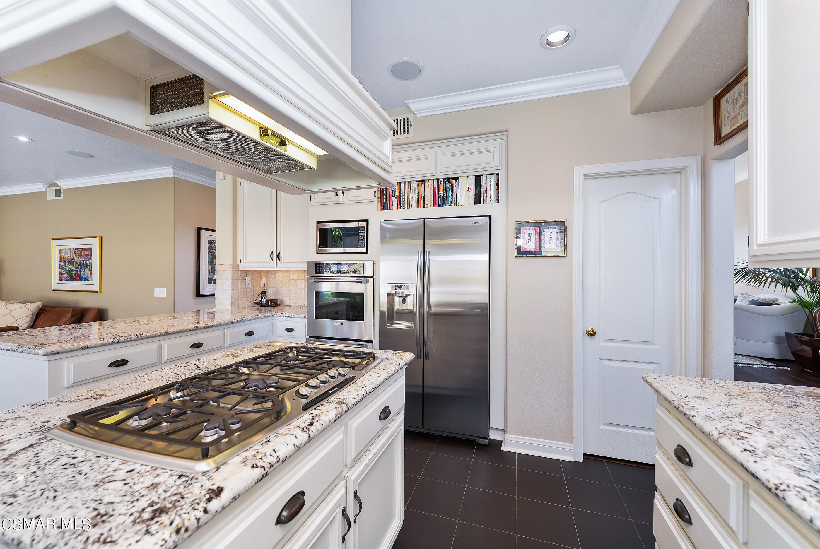 3019 Shadow Hill Circle Thousand Oaks, CA 91360 - Photo 9 of 30 a kitchen with stainless steel appliances granite countertop a stove a refrigerator and a sink