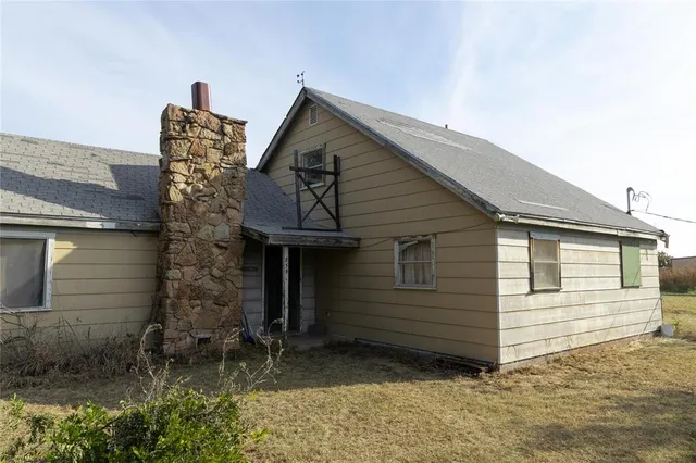a backyard of a house with lots of green space
