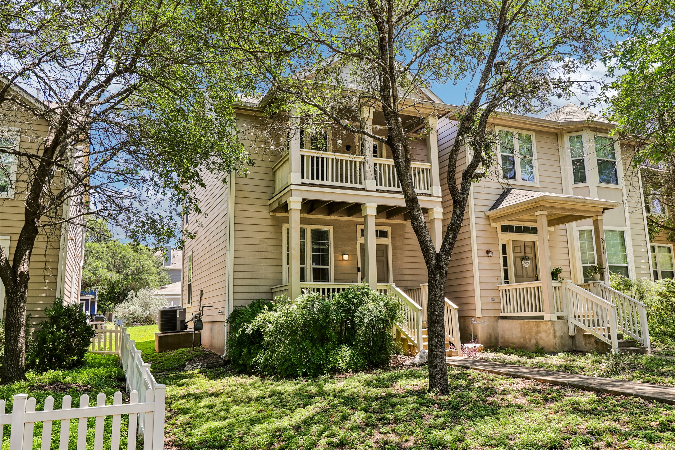 311 A Utterback Kyle, TX 78640 - Photo 2 of 40 front view of a house with a yard