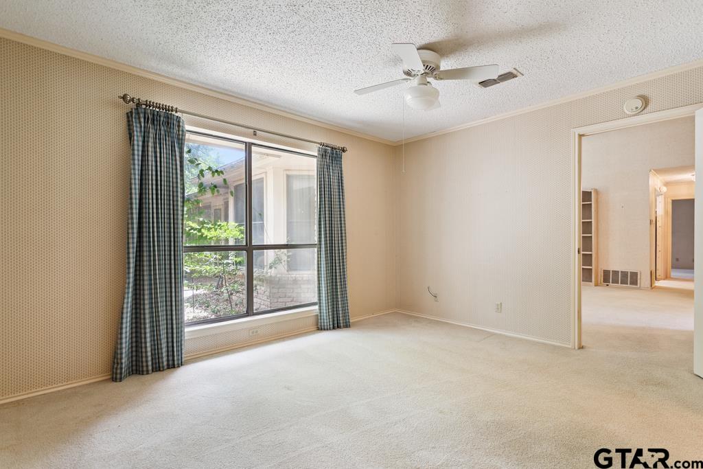 227 Brookside Drive Hideaway, TX 75771 - Photo 26 of 35 a view of an empty room with a window