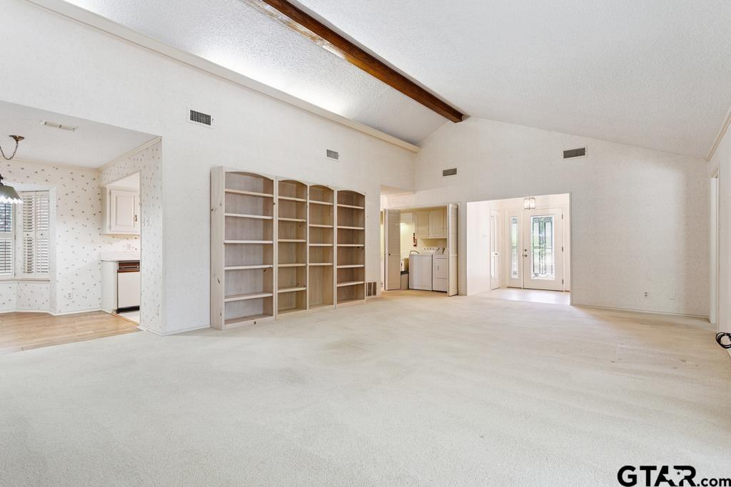 227 Brookside Drive Hideaway, TX 75771 - Photo 5 of 35 a view of an empty room with a window