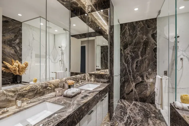 a bedroom with bed and windows