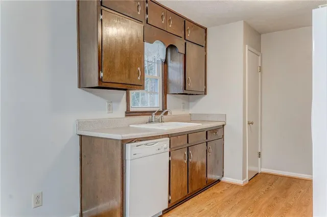a view of a bathroom from a hallway