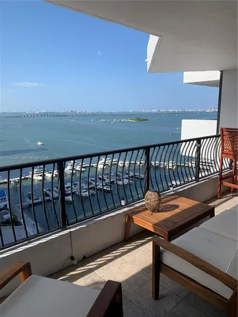a balcony with wooden floor
