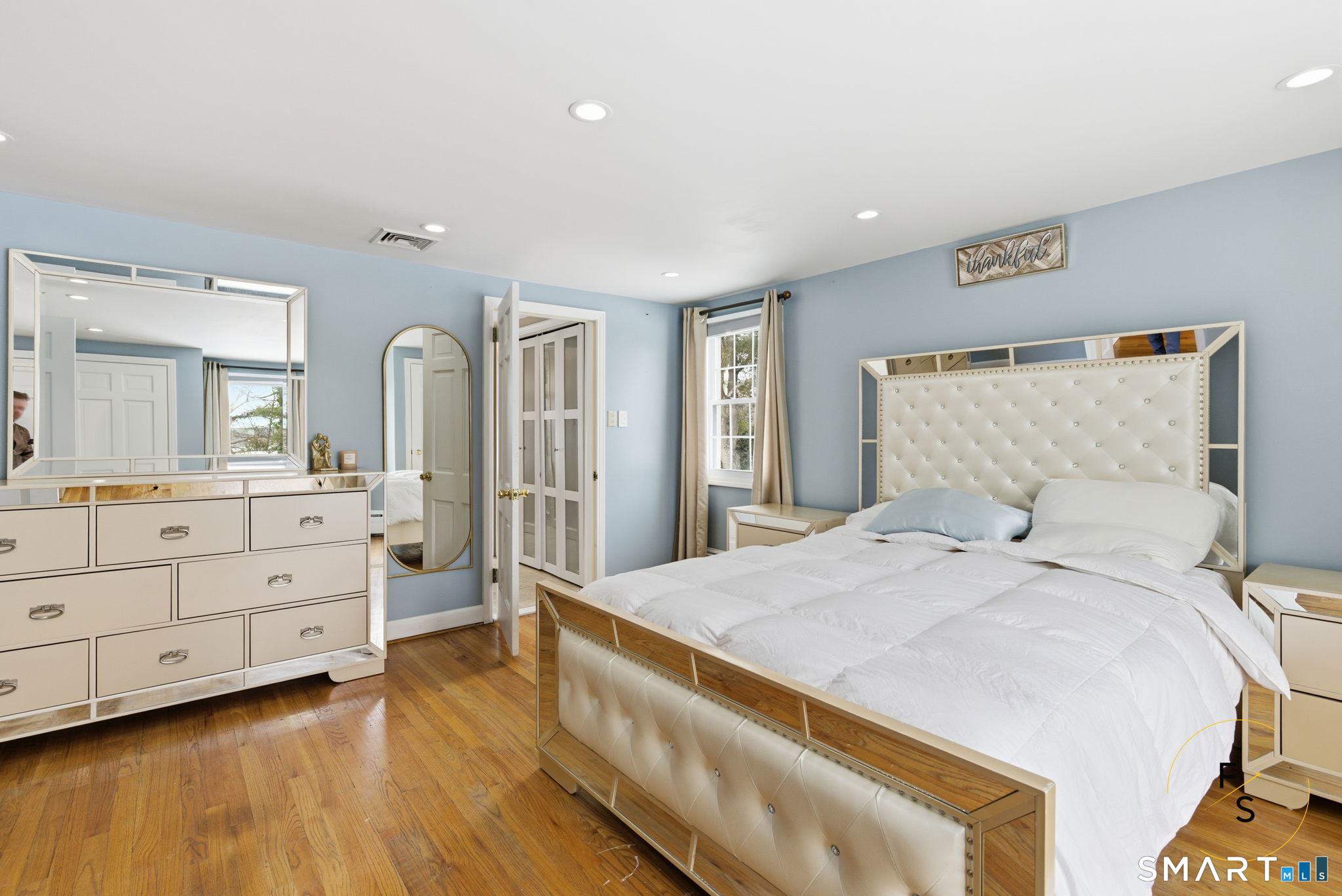 508 Highland Street Wethersfield, CT 06109 - Photo 16 of 39 a spacious bedroom with a bed and a dresser