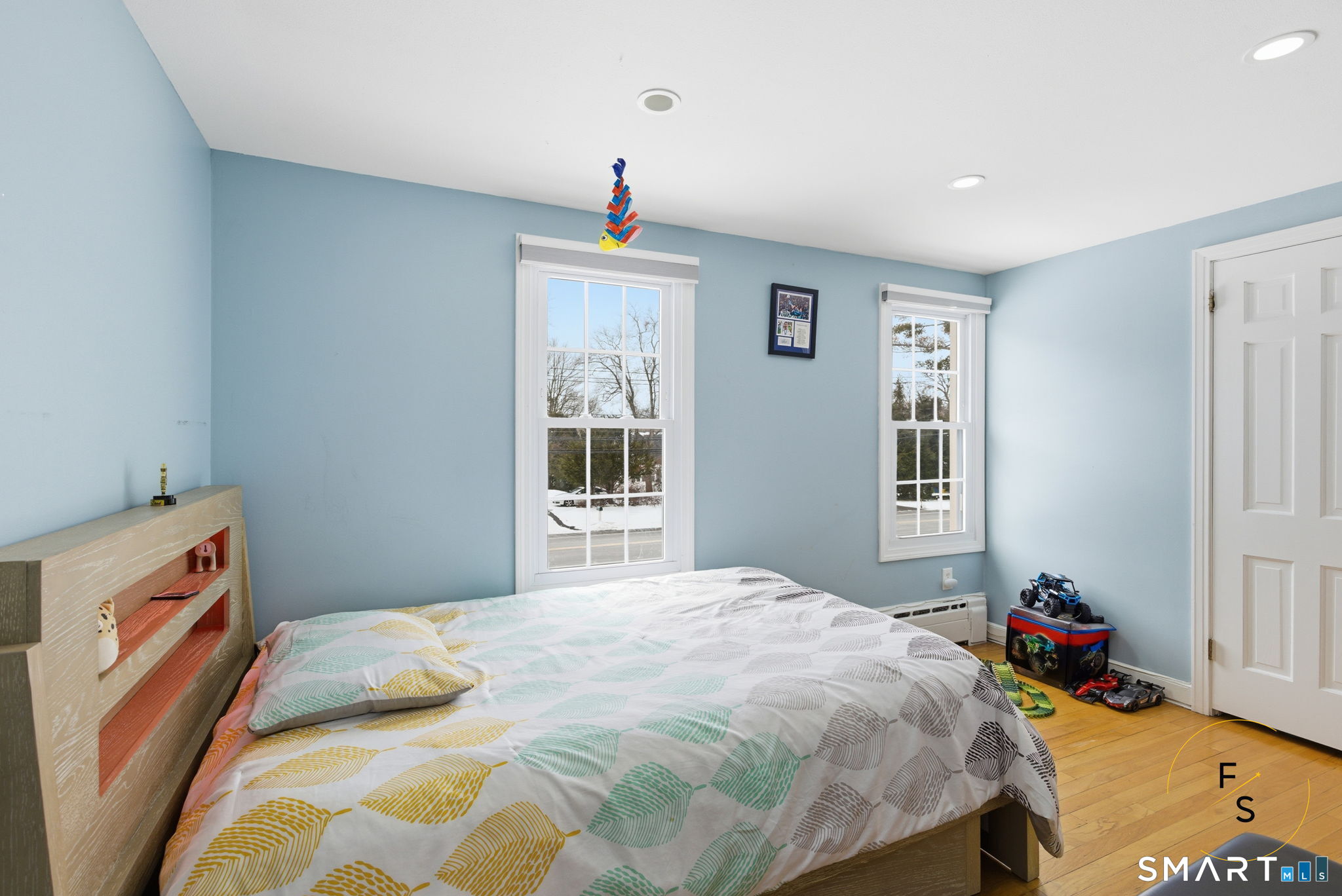 508 Highland Street Wethersfield, CT 06109 - Photo 19 of 39 a bedroom with a bed and a window