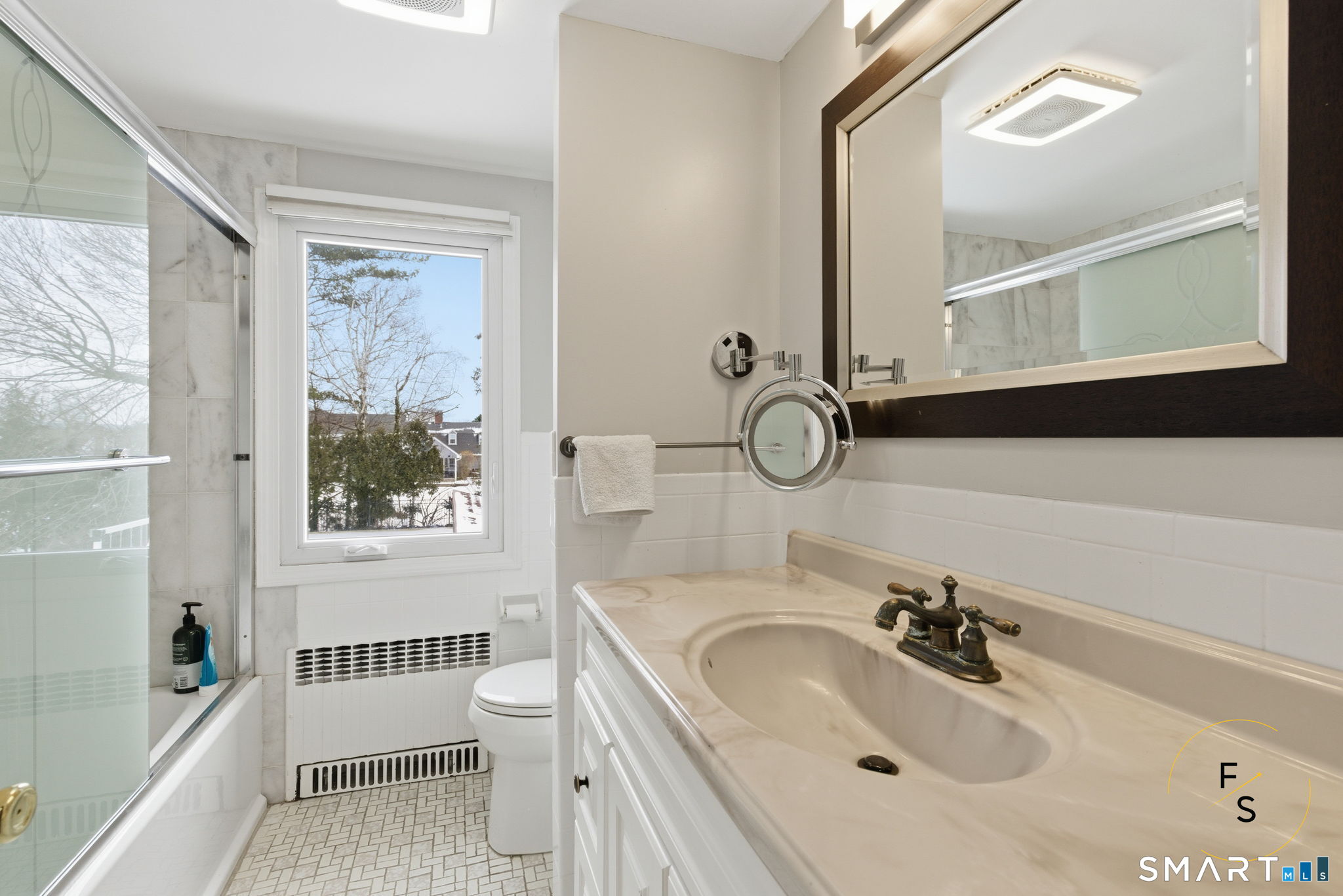 508 Highland Street Wethersfield, CT 06109 - Photo 21 of 39 a bathroom with a sink double vanity mirror and a toilet
