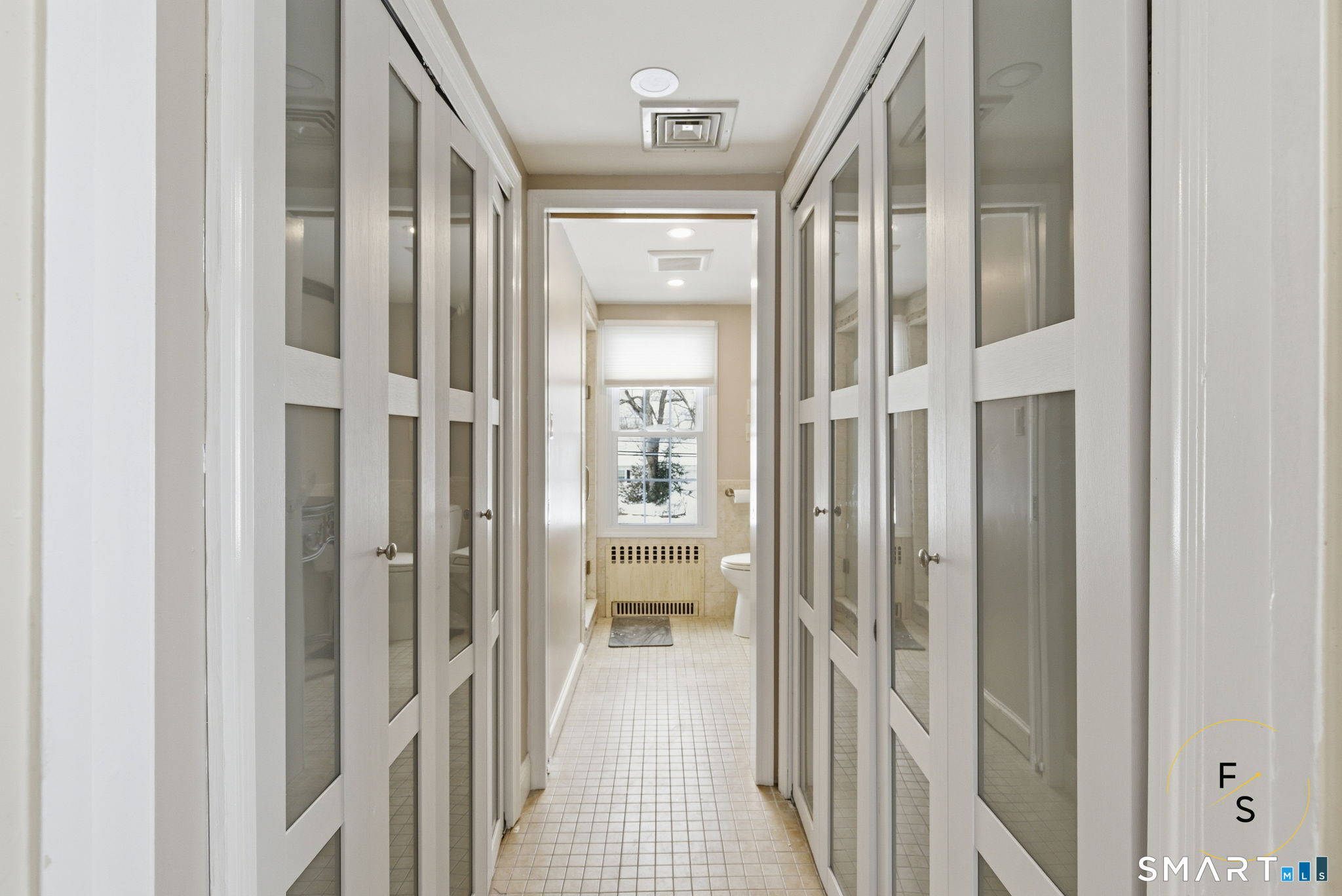 508 Highland Street Wethersfield, CT 06109 - Photo 22 of 39 a view of a bathroom from a hallway