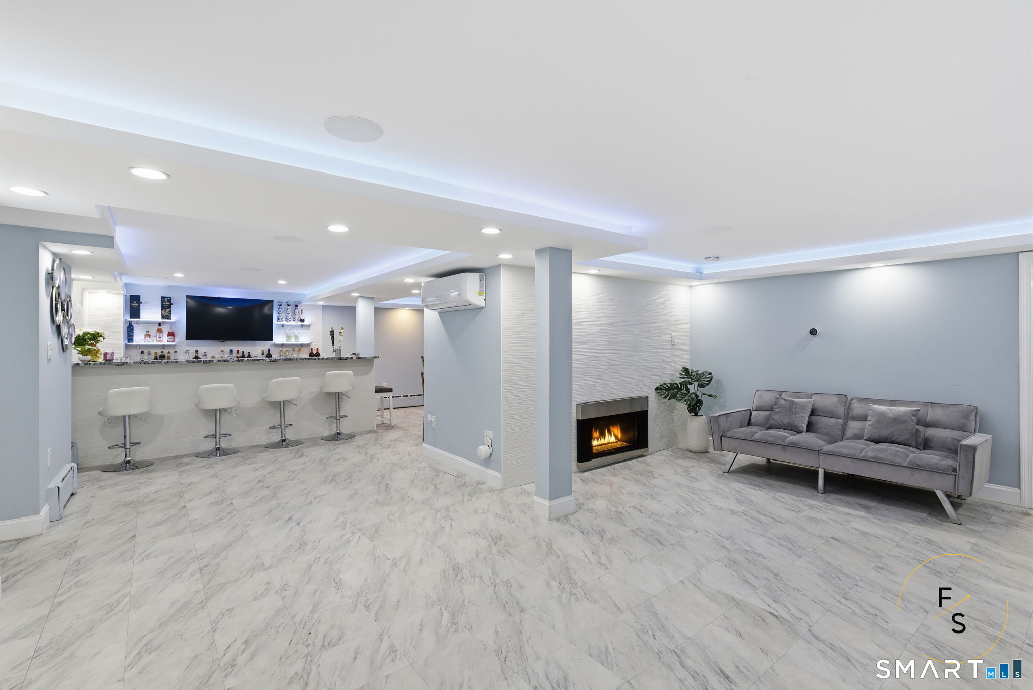 508 Highland Street Wethersfield, CT 06109 - Photo 25 of 39 a living room with furniture and a flat screen tv