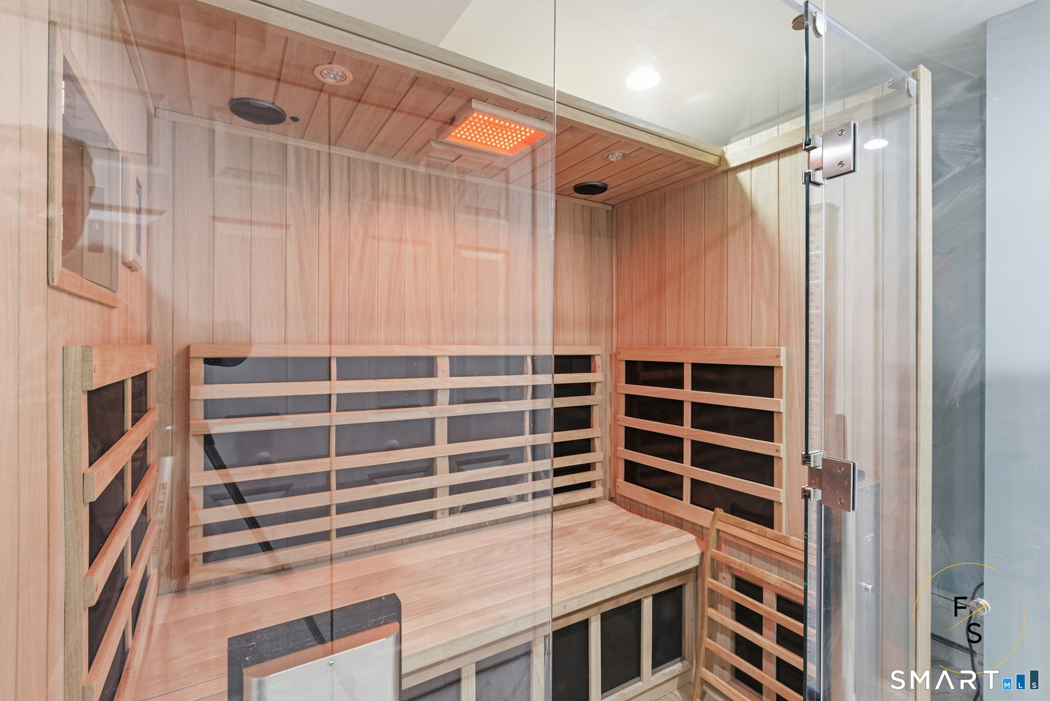 508 Highland Street Wethersfield, CT 06109 - Photo 31 of 39 a view of walk in closet and wooden shelves