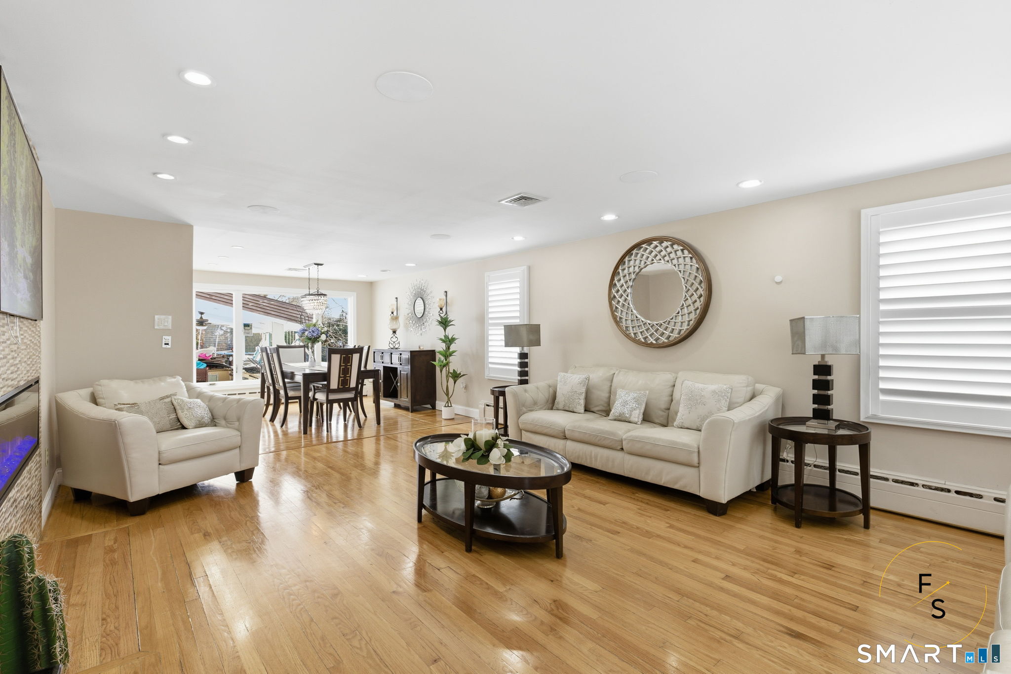 508 Highland Street Wethersfield, CT 06109 - Photo 4 of 39 a living room with furniture and a wooden floor