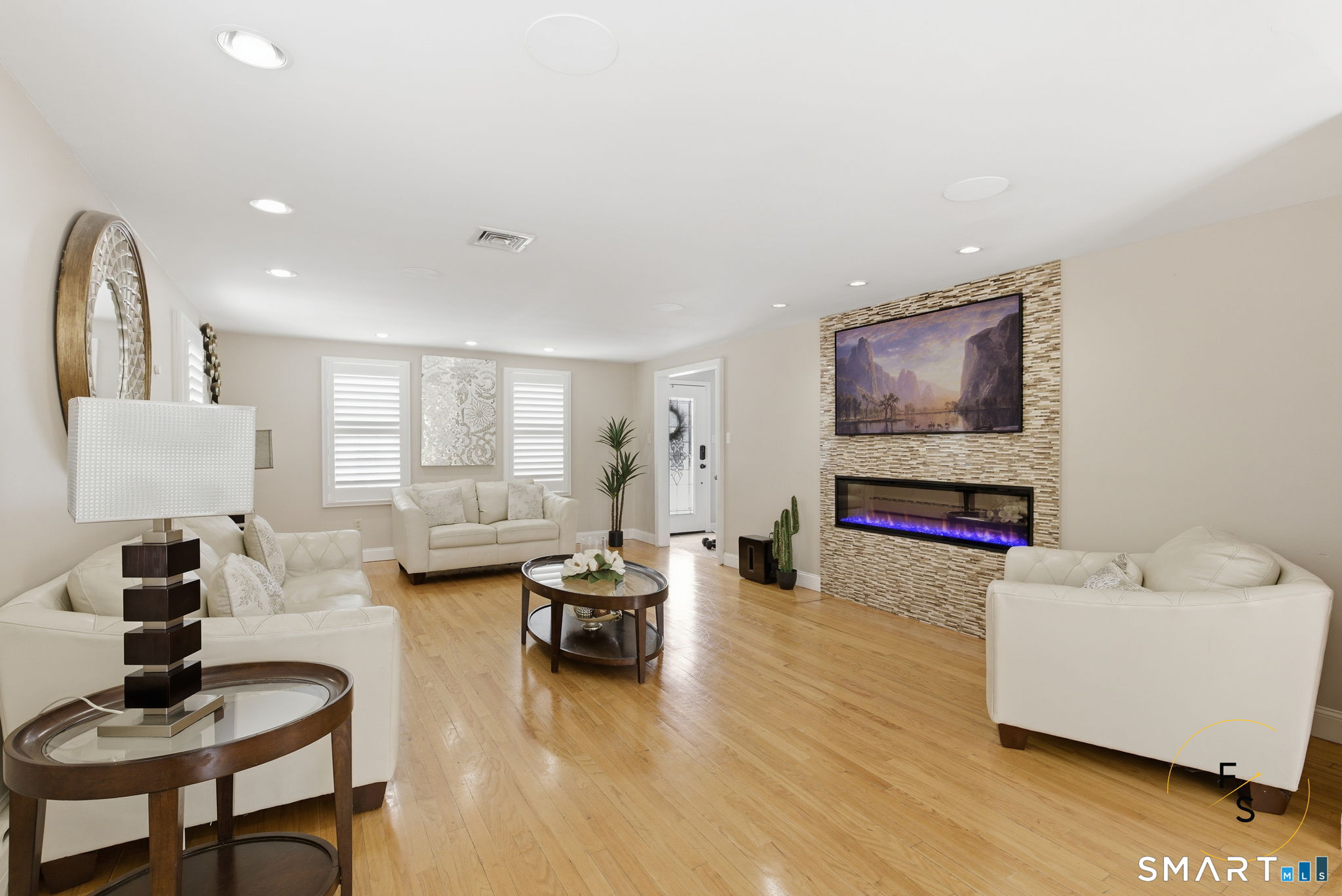 508 Highland Street Wethersfield, CT 06109 - Photo 5 of 39 a living room with furniture and a flat screen tv