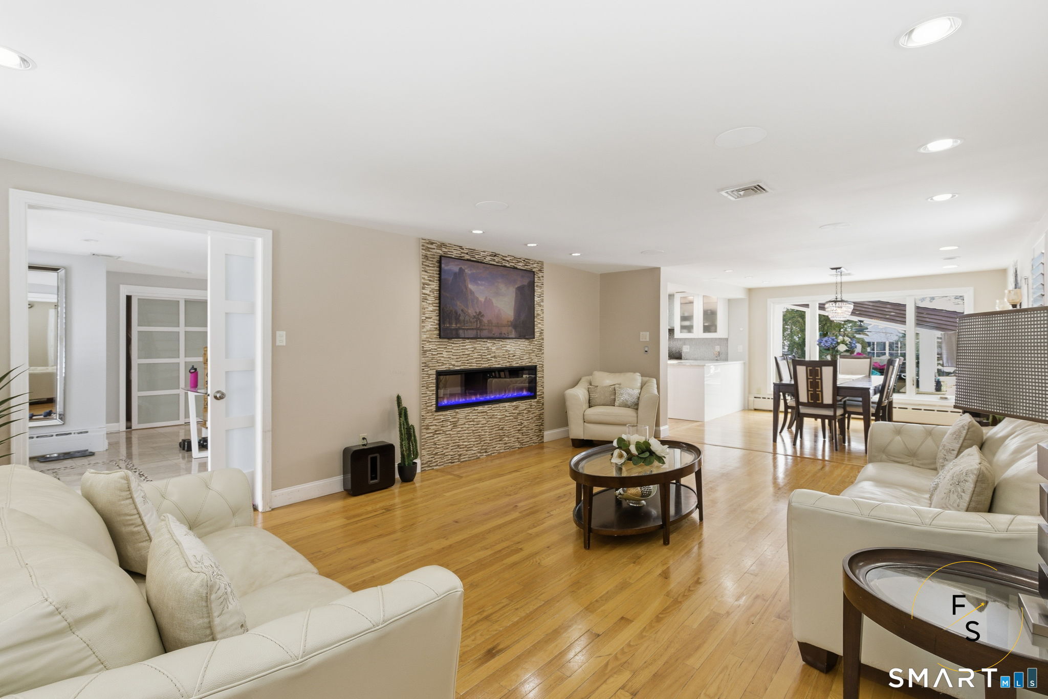 508 Highland Street Wethersfield, CT 06109 - Photo 6 of 39 a living room with furniture and a flat screen tv