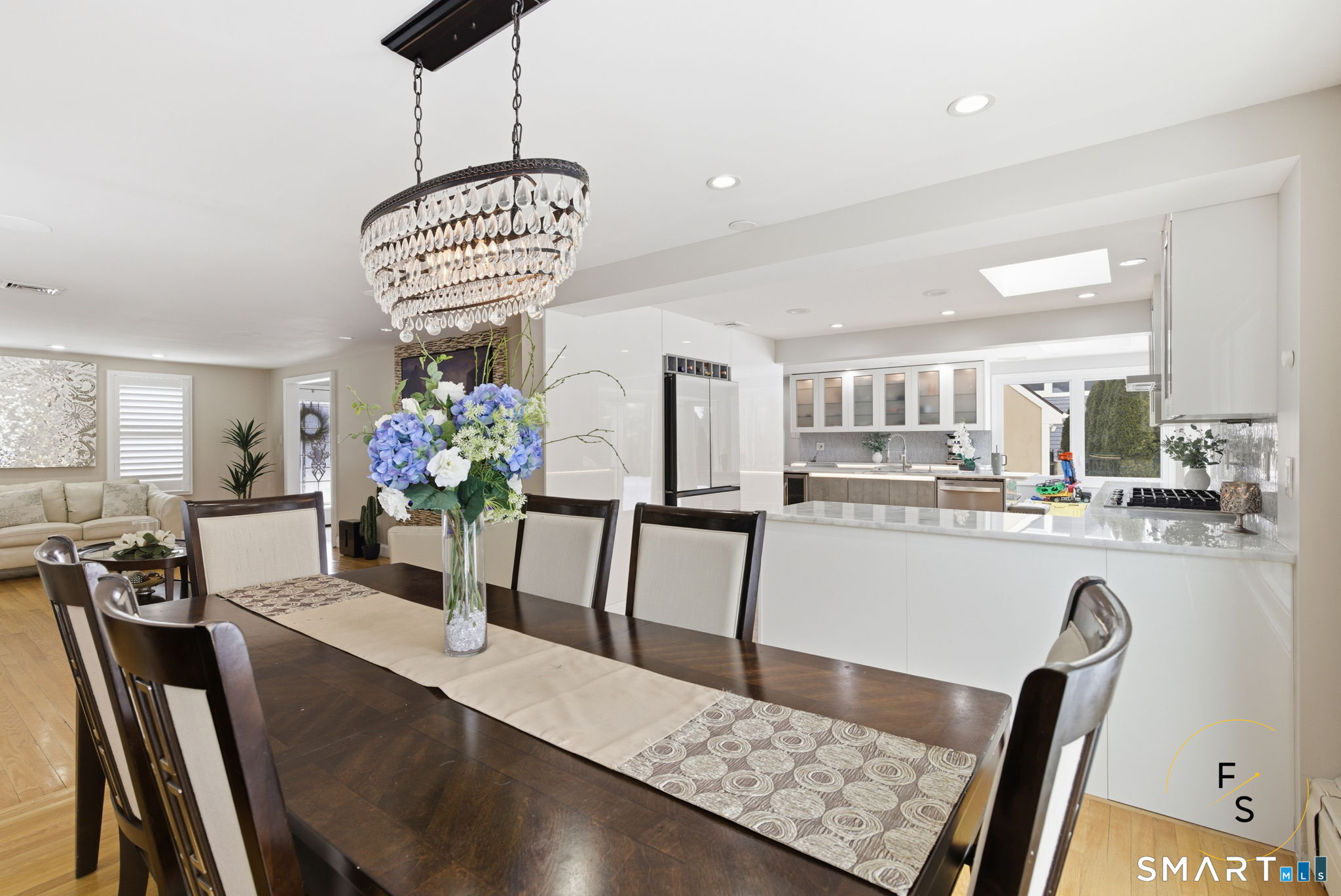 508 Highland Street Wethersfield, CT 06109 - Photo 8 of 39 a kitchen with stainless steel appliances granite countertop sink microwave and white cabinets
