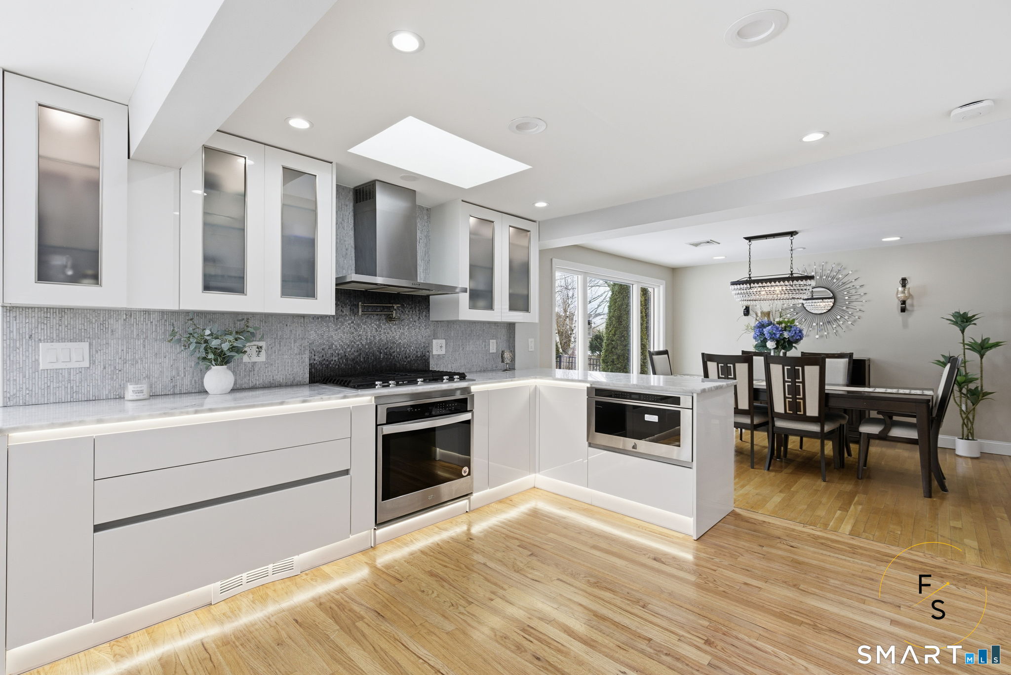 508 Highland Street Wethersfield, CT 06109 - Photo 9 of 39 a kitchen with stainless steel appliances granite countertop a stove and a sink