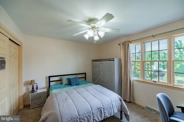 a front view of a mirror with entryway