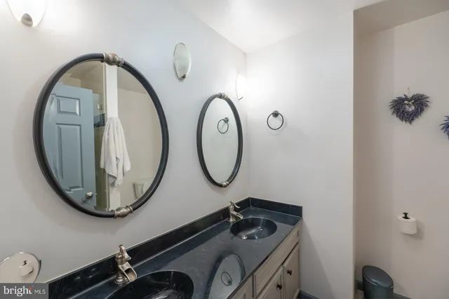 a view of a patio with table and chairs and potted plants