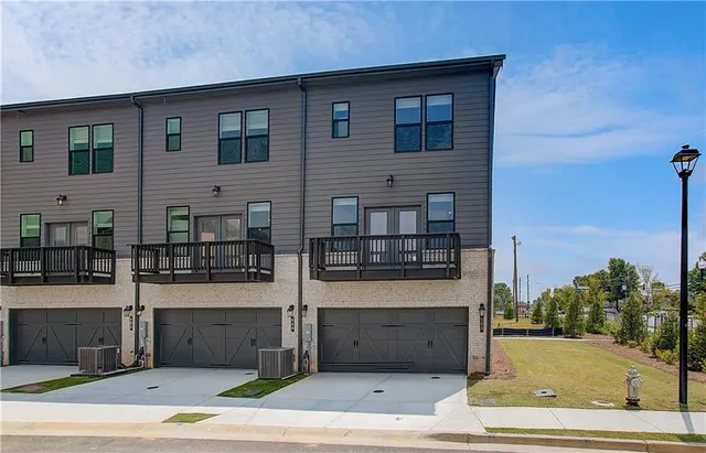 a view of a building with a street