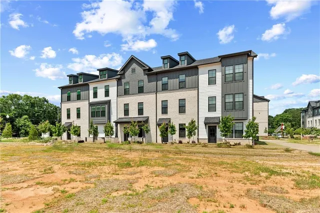 a front view of building with street