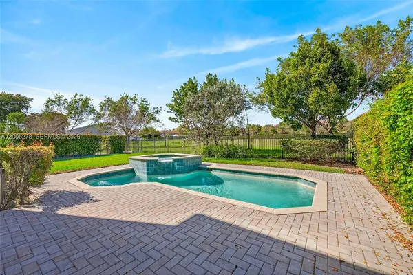 a view of outdoor space yard swimming pool and green space