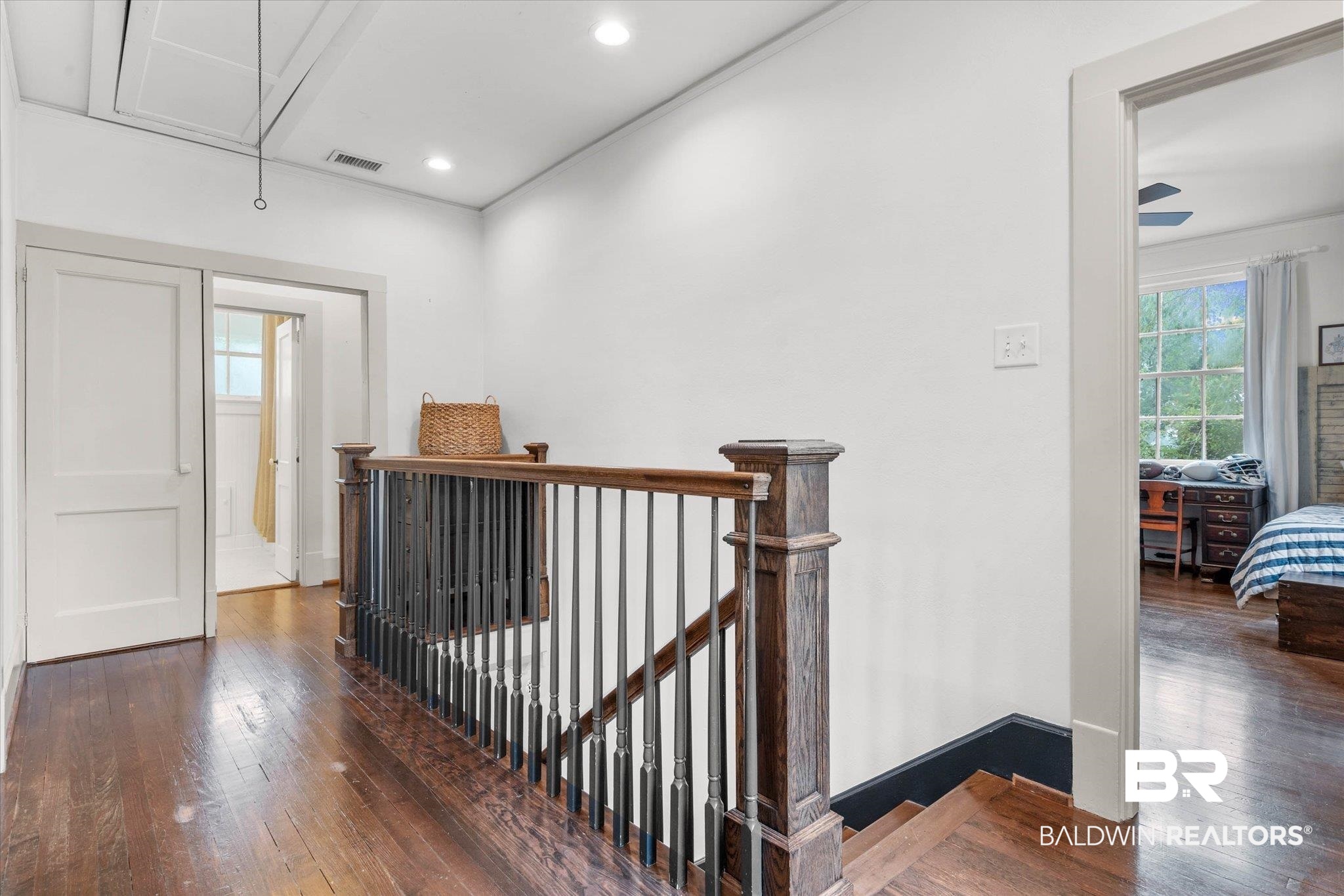 3863 Old Shell Road Mobile, AL 36608 - Photo 19 of 48 Hardwood flooring throughout the hallway and open room
