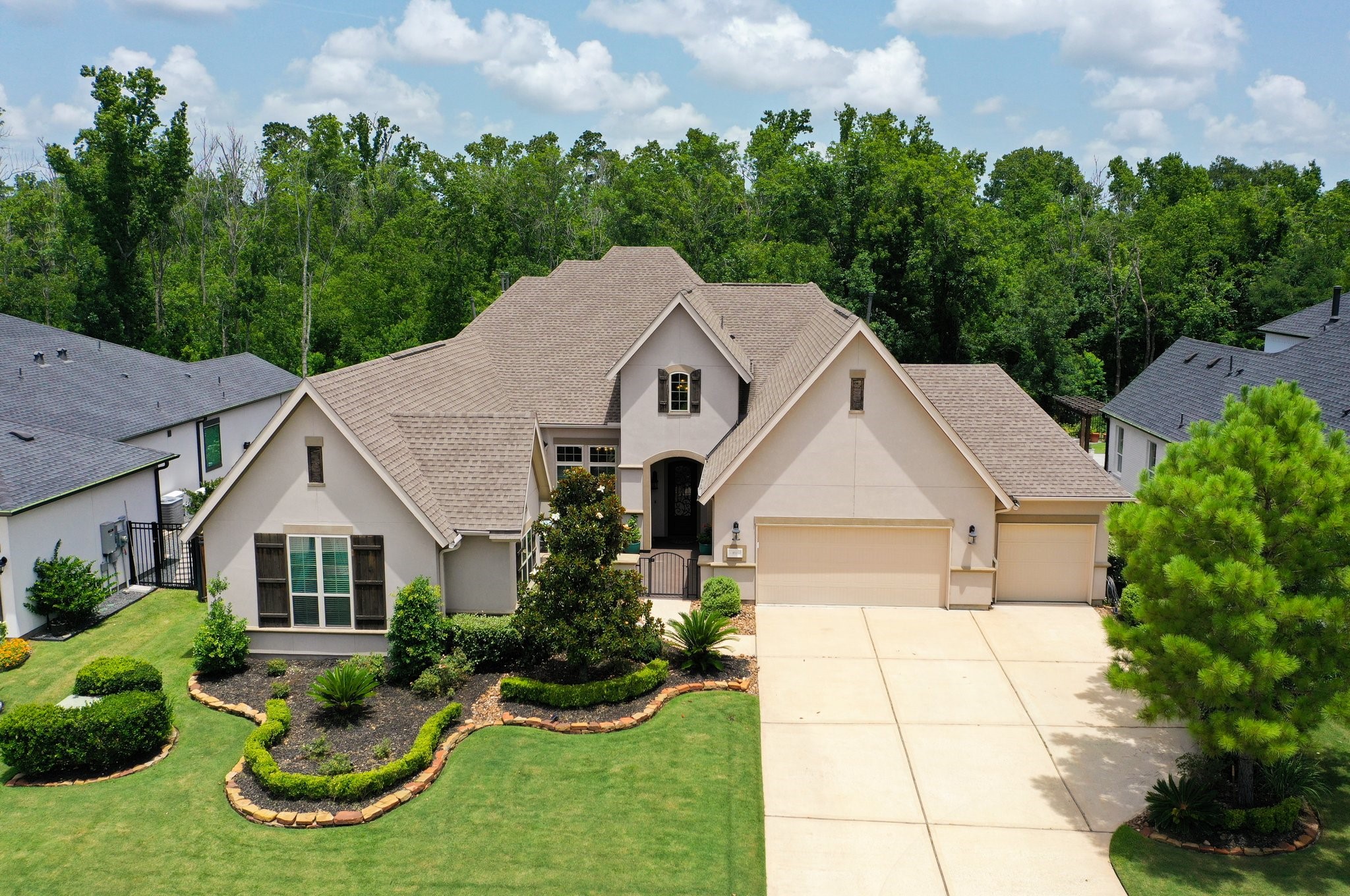 The curb appeal is truly stunning, and Tynan Ridge is one of the most sought-after streets in the community.
