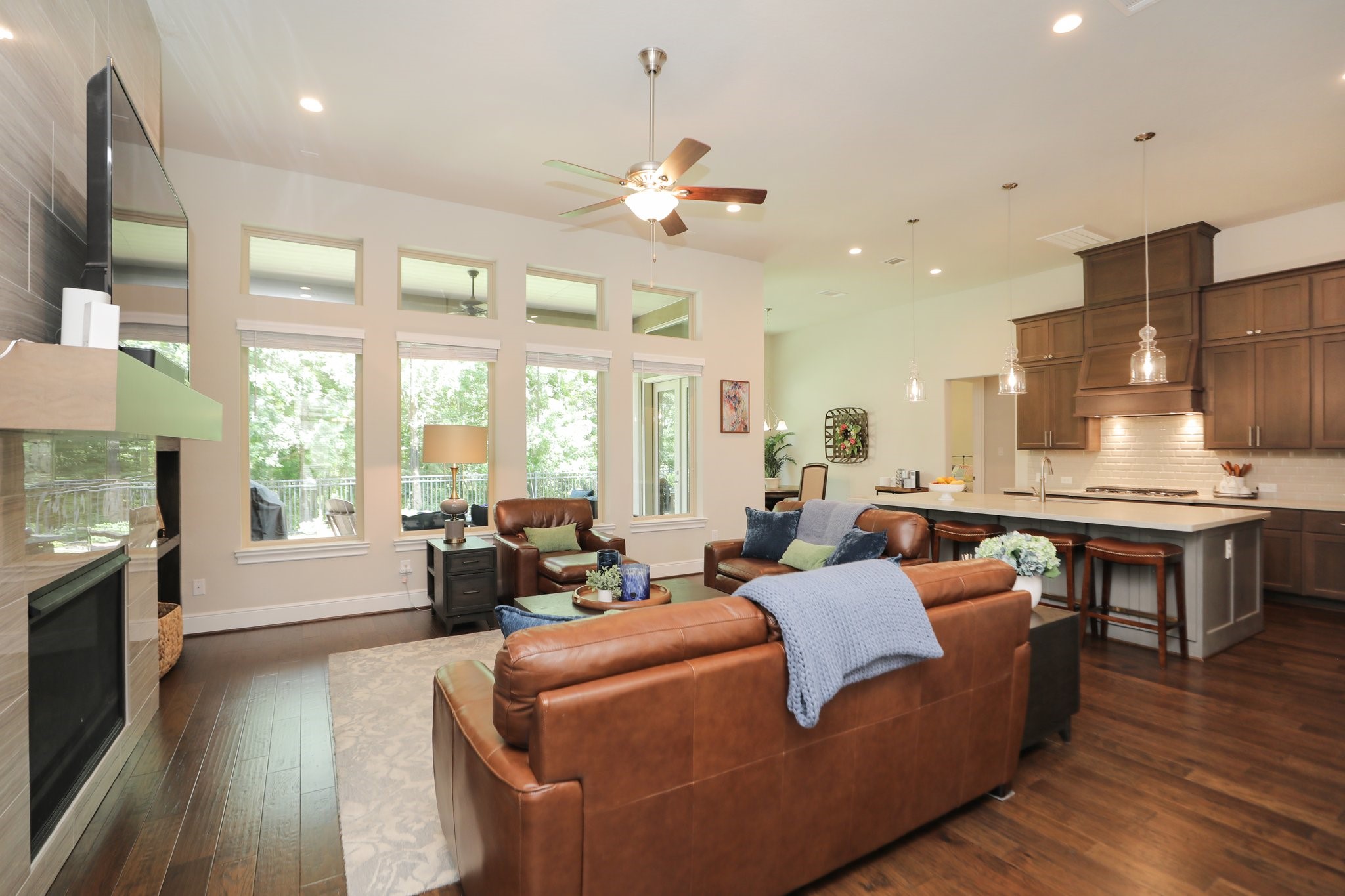 8511 Tynan Ridge Drive Magnolia, TX 77354 - Photo 12 of 50 The living space overlooks your private backyard, an ideal setting to create the lap pool you’ve been dreaming of. At the heart of the home, the well-appointed kitchen offers both style and function, perfect for everyday living and entertaining alike.