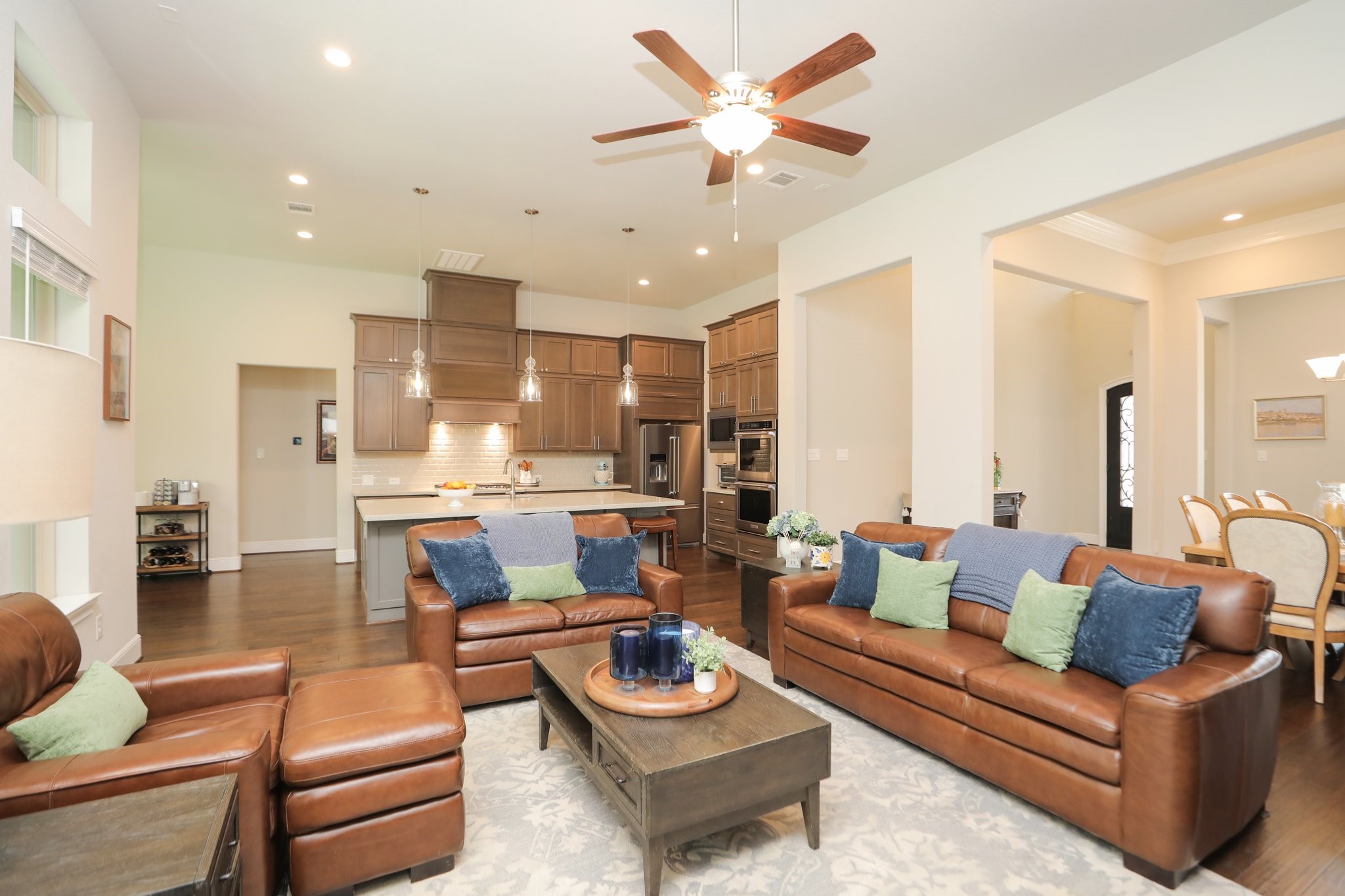 8511 Tynan Ridge Drive Magnolia, TX 77354 - Photo 14 of 50 a living room with furniture and a view of kitchen