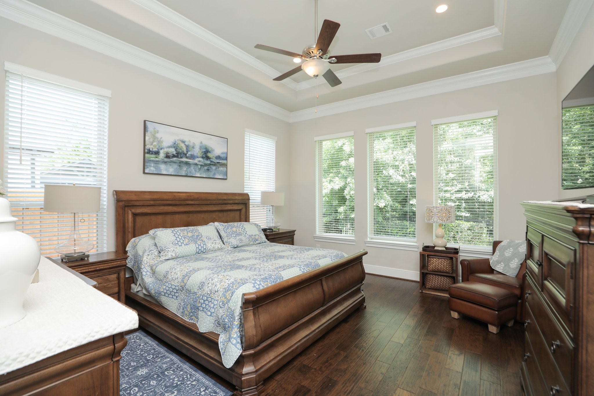 8511 Tynan Ridge Drive Magnolia, TX 77354 - Photo 21 of 50 a bedroom with a bed and a couch