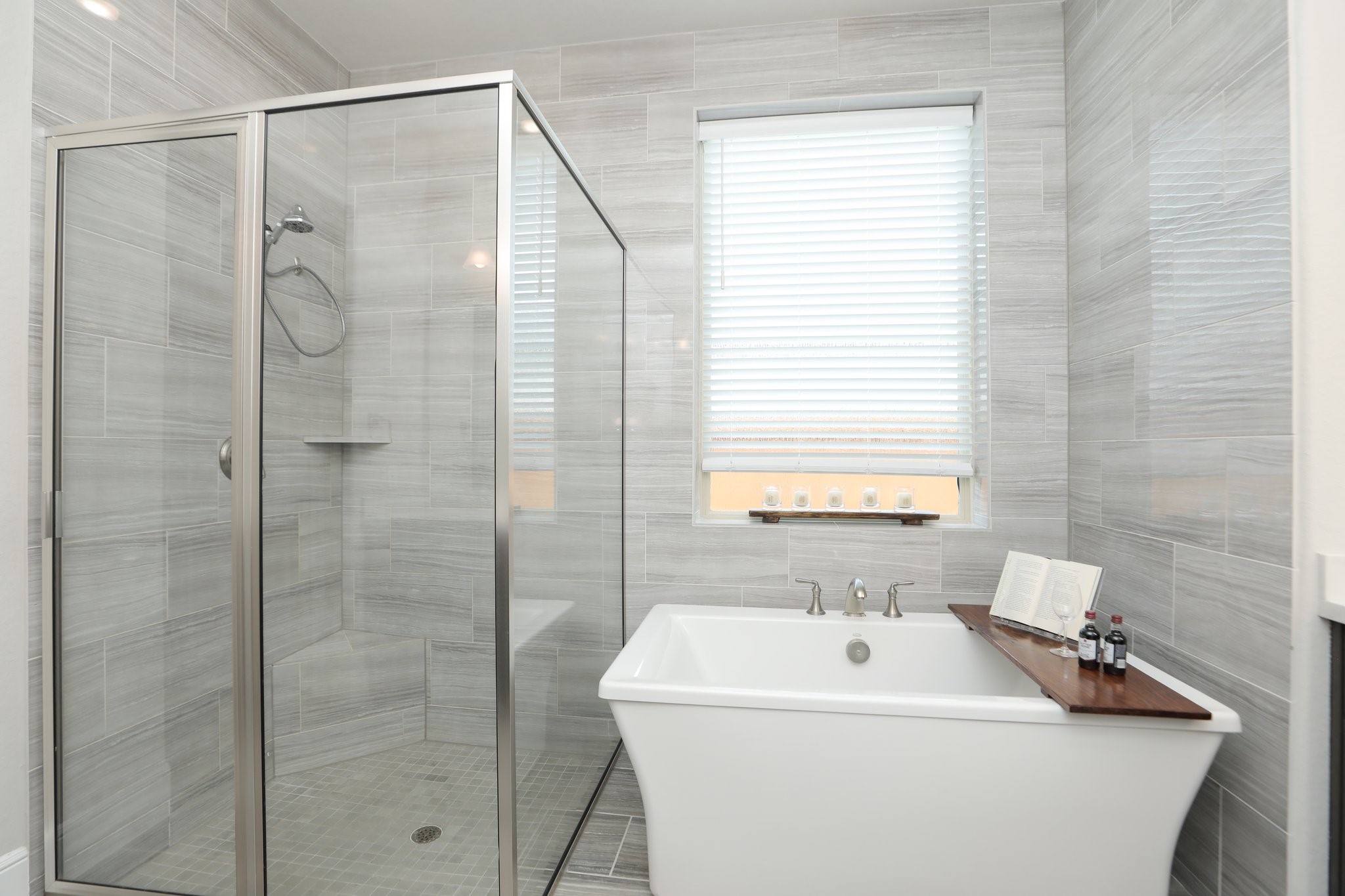 8511 Tynan Ridge Drive Magnolia, TX 77354 - Photo 24 of 50 a bathroom with a sink a shower and a mirror