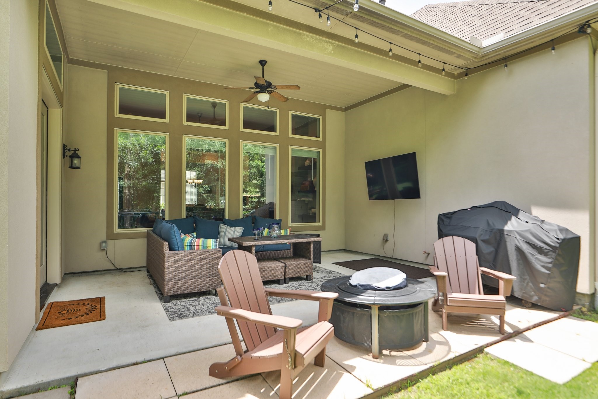 8511 Tynan Ridge Drive Magnolia, TX 77354 - Photo 39 of 50 The outdoor lighting can stay creating the perfect ambiance to unwind and enjoy your private backyard retreat.