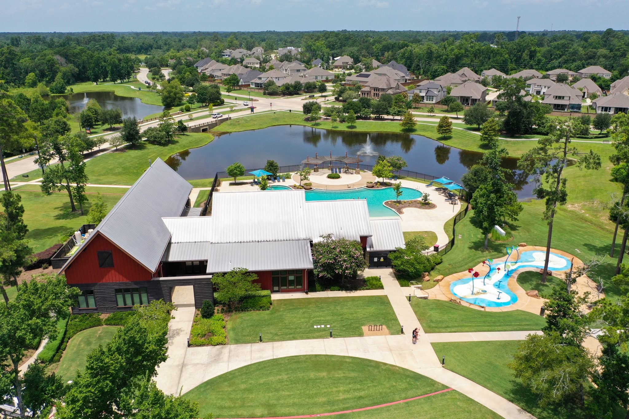 8511 Tynan Ridge Drive Magnolia, TX 77354 - Photo 5 of 50 an aerial view of a house with yard swimming pool and outdoor seating