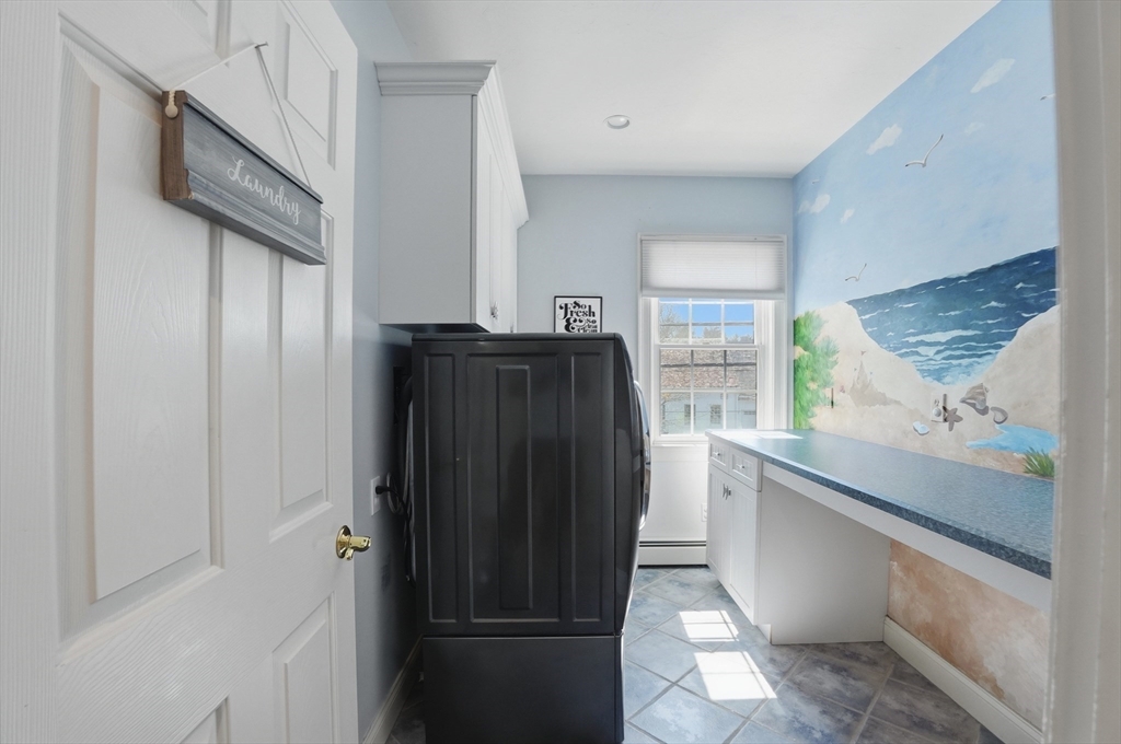 183 Whiting Street Hanover, MA 02339 - Photo 33 of 42 a kitchen with stainless steel appliances granite countertop a refrigerator and a sink