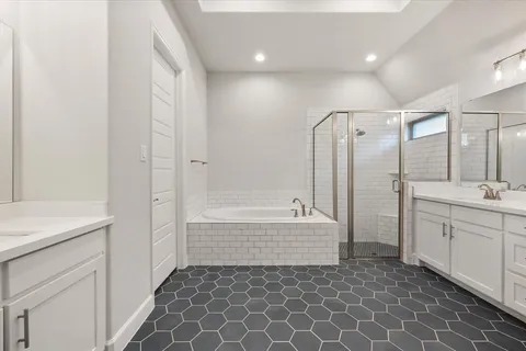 a view of walk in closet with clothes