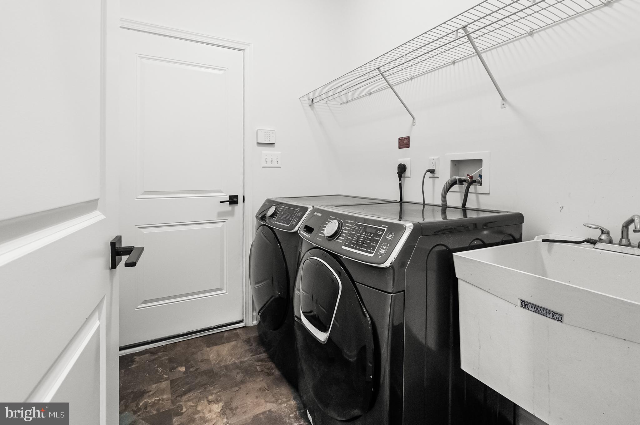 4603 Thoroughbred Drive Upper Marlboro, MD 20772 - Photo 12 of 64 a utility room with dryer and washer